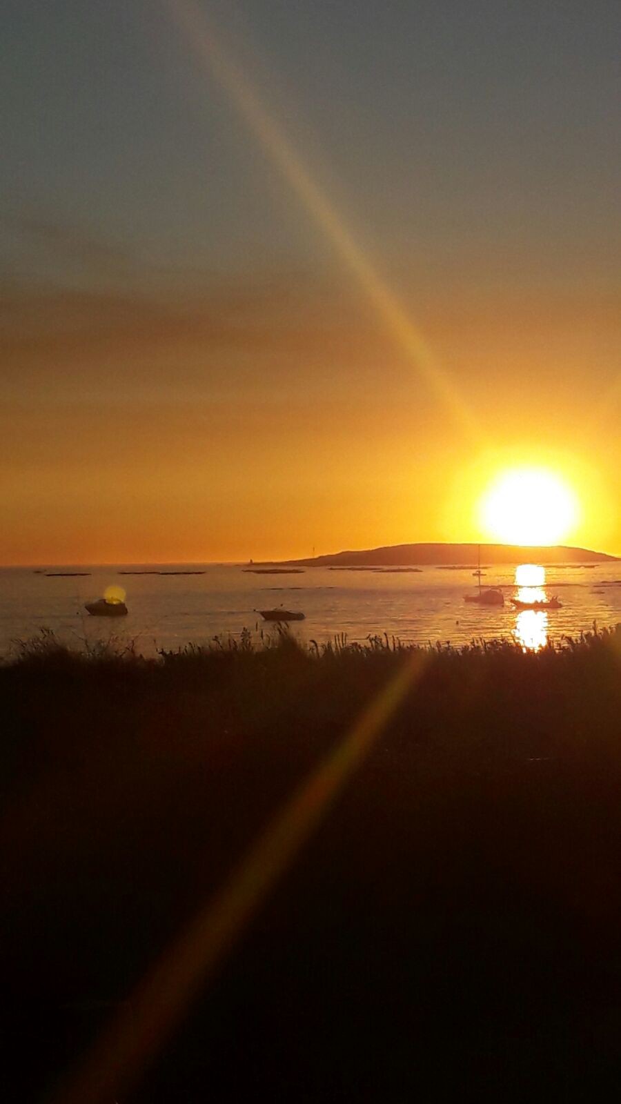 Atardecer en playa América 