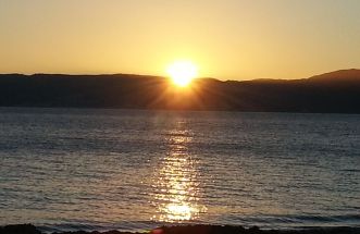 Puesta de sol desde la playa de coira